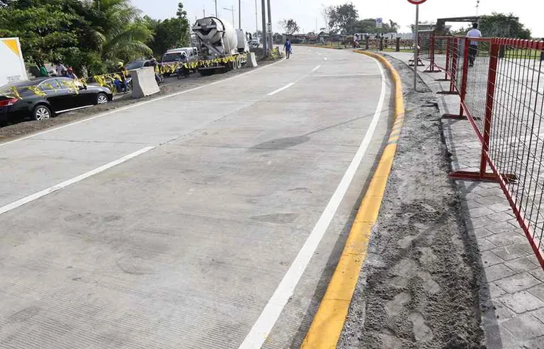 DPWH completes additional 700 meter road along Laguna Lake Highway ...