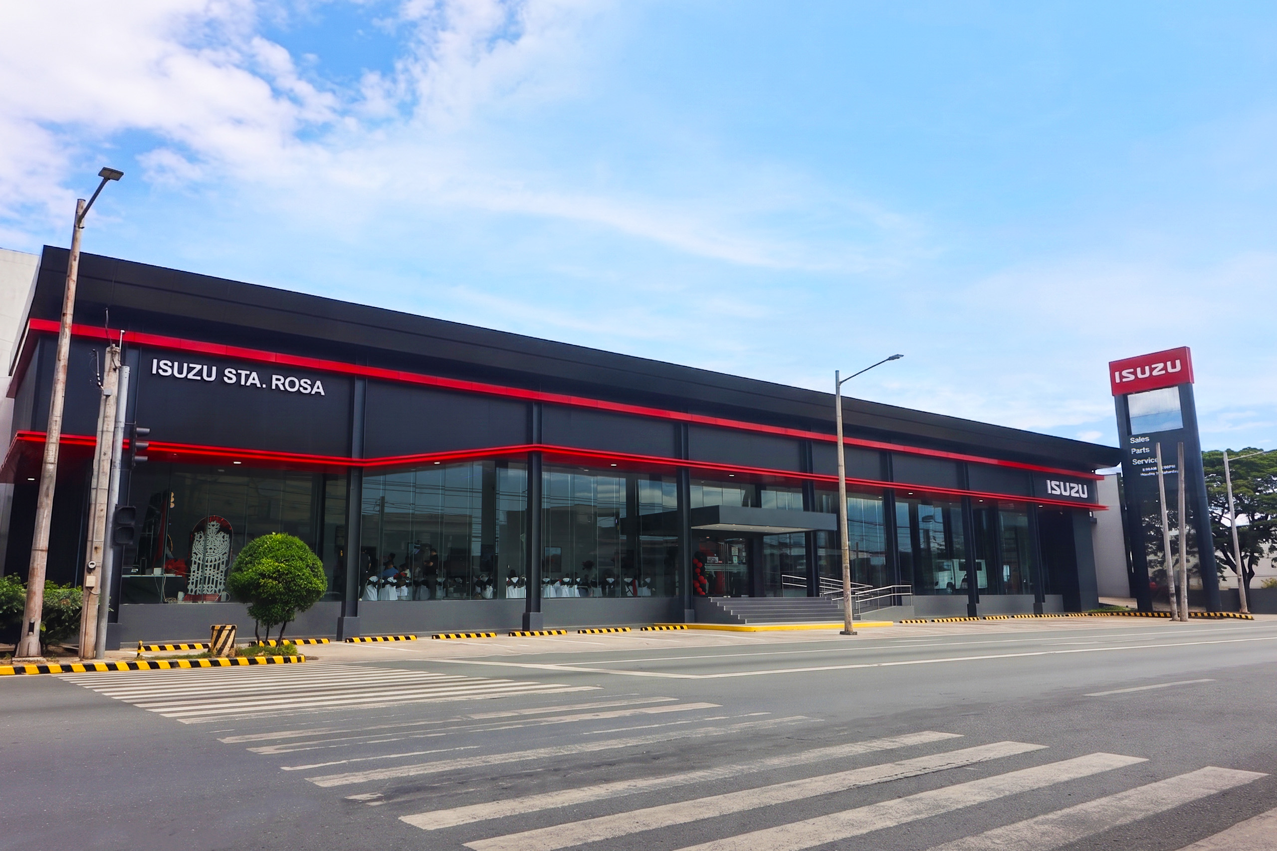 Isuzu PH reopens Sta. Rosa dealership with modernized look