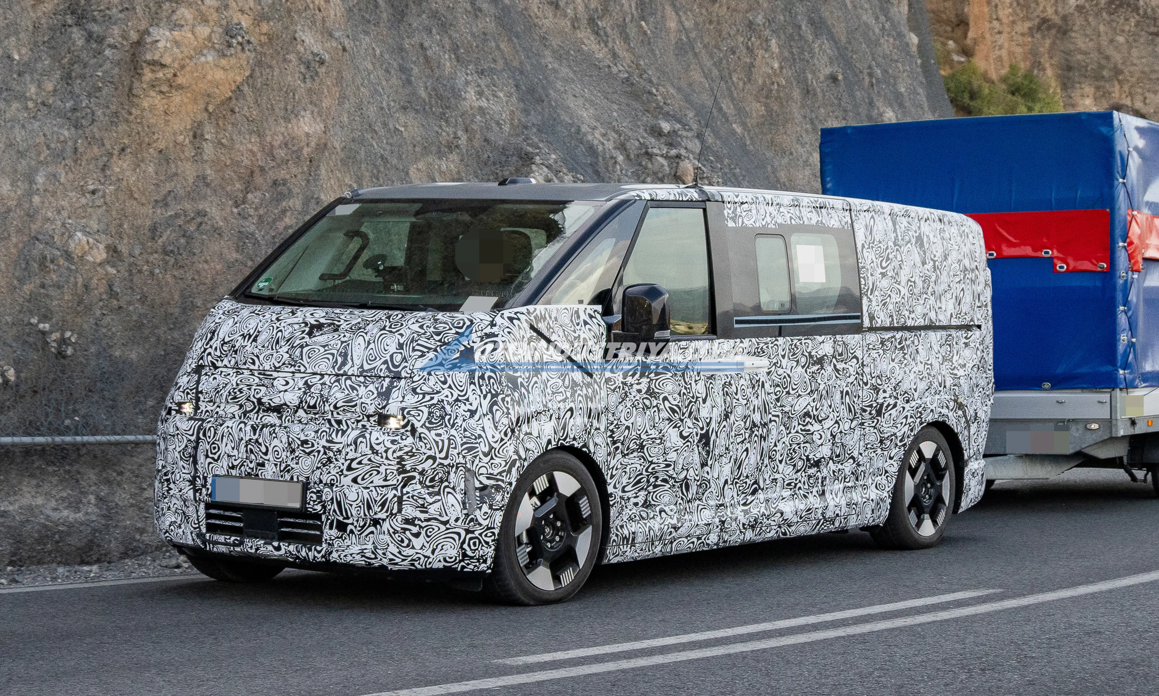 Larger Kia PV7 electric van spotted preparing for September debut in two weeks