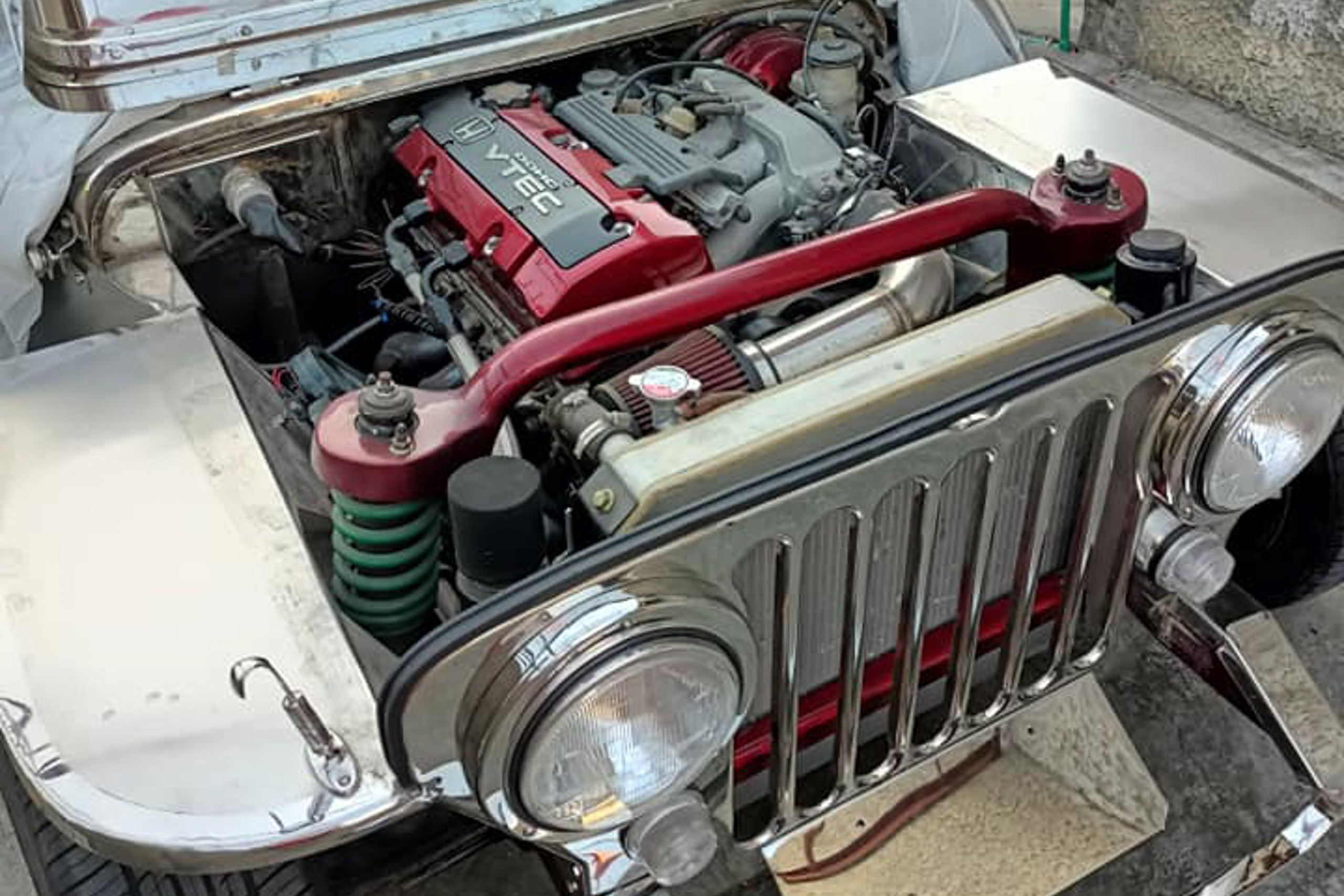 Stainless Sleeper: Owner jeep with Honda S2000 engine for sale