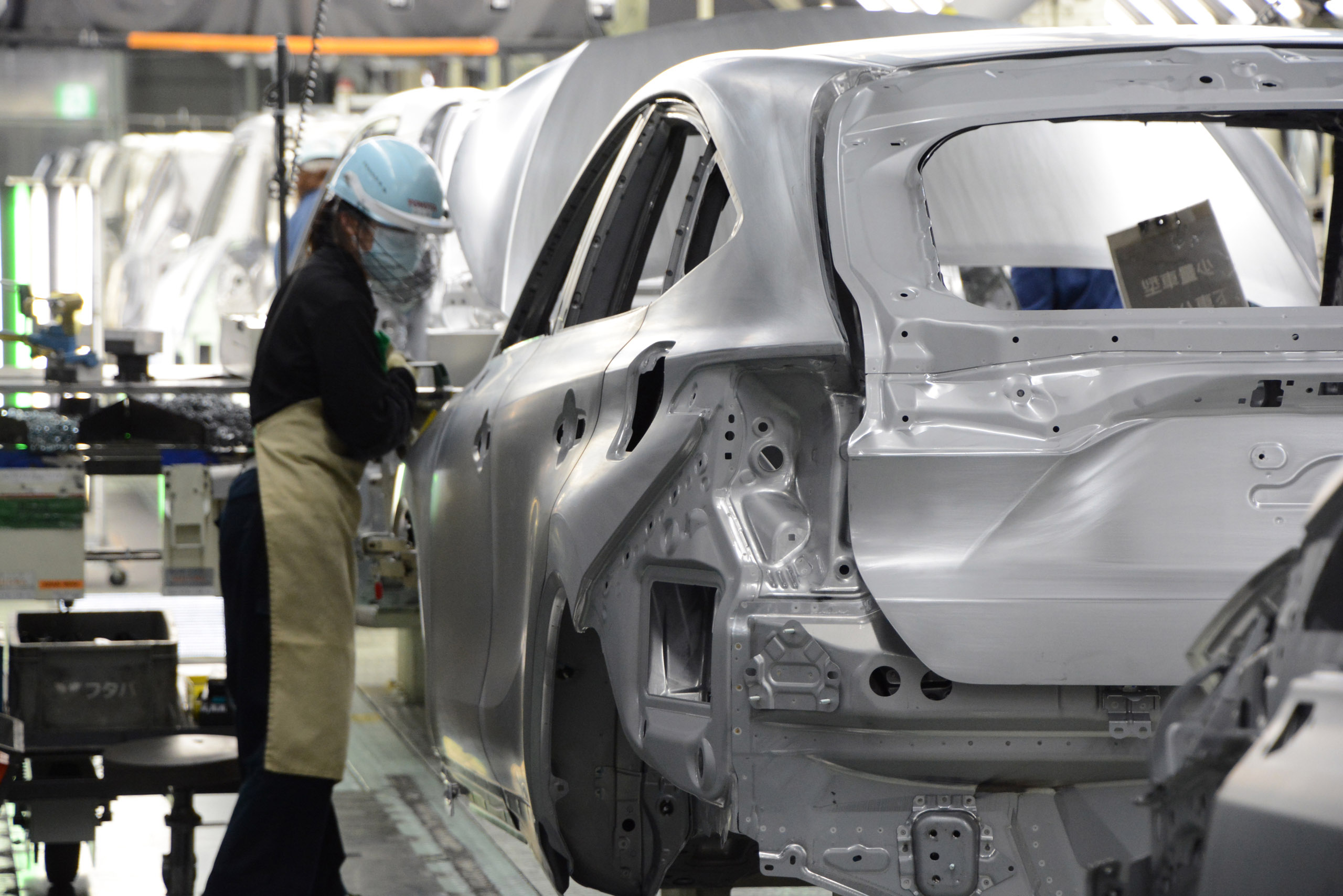 Japan's big automakers and parts makers are teaming up