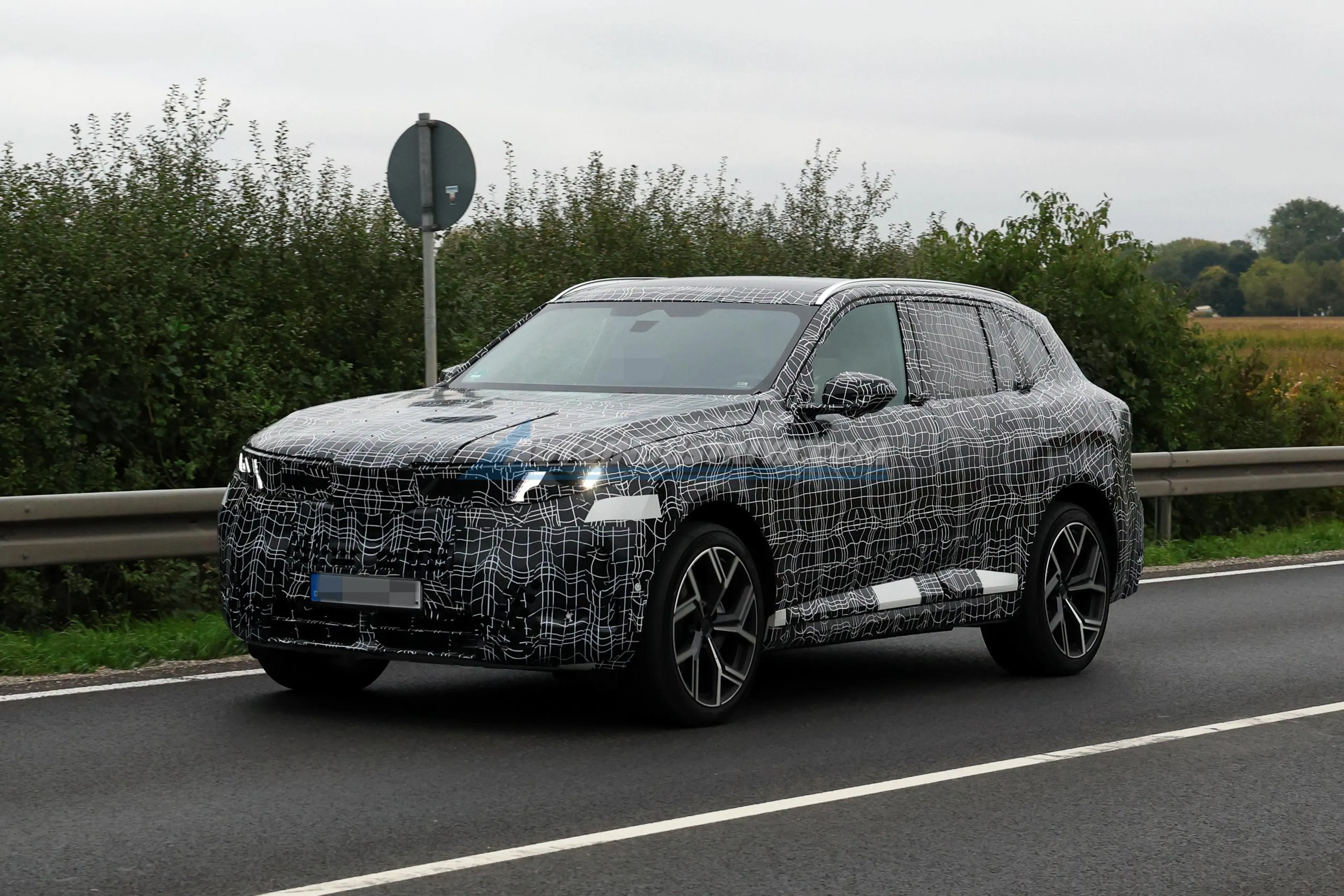 SPIED: Next-gen BMW X5 spotted anew with production lights